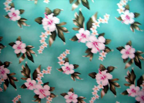 Tropical Hawaiian vintage hibiscus and plumeria flowers on an aqua apparel fabric