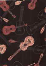 Ukulele instruments on a black cotton apparel fabric