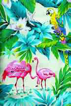 Flamingos and palm treeds on a cream cotton apparel fabric